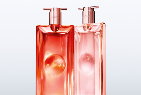 Lancôme Idôle Peach 'n Roses Eau de Parfum – zwei Flakons in Orange und Rosa vor hellem Hintergrund