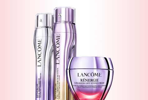 Lancôme Rénergie Pflegeprodukte mit zwei silber-violetten Serumflakons und violettem Cremetiegel vor zartem Farbverlauf.